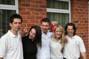 Team outside clinic opening